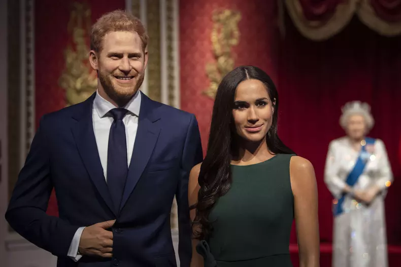Prince Harry and Meghan step back as senior royals