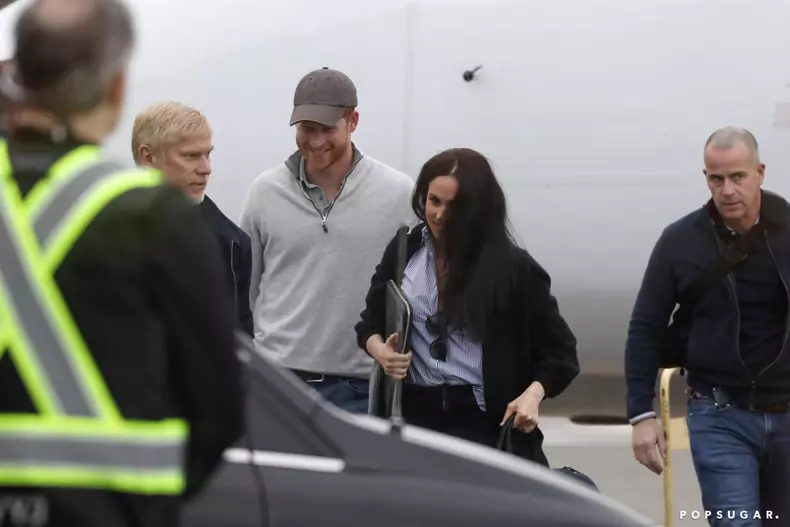 prince-harry-meghan-markle-at-airport-in-canada-pictures