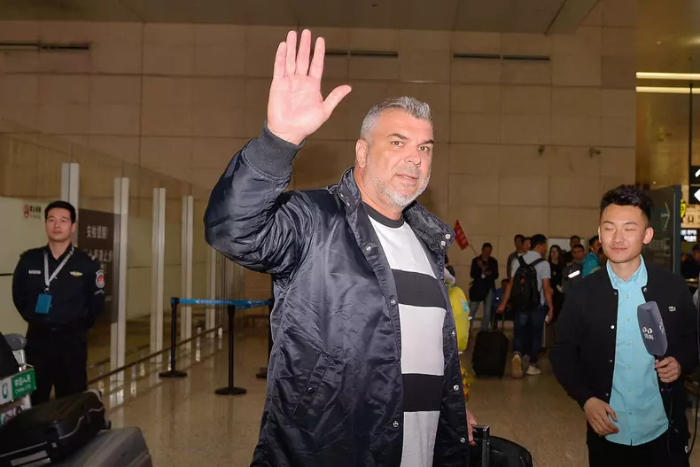 Jiang Suning new head coach Cosmin Olaroiu arrives at Nanjing