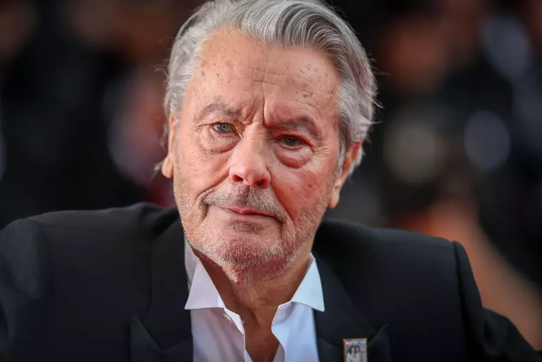 Cannes - Alain Delon Walks The Red Carpet