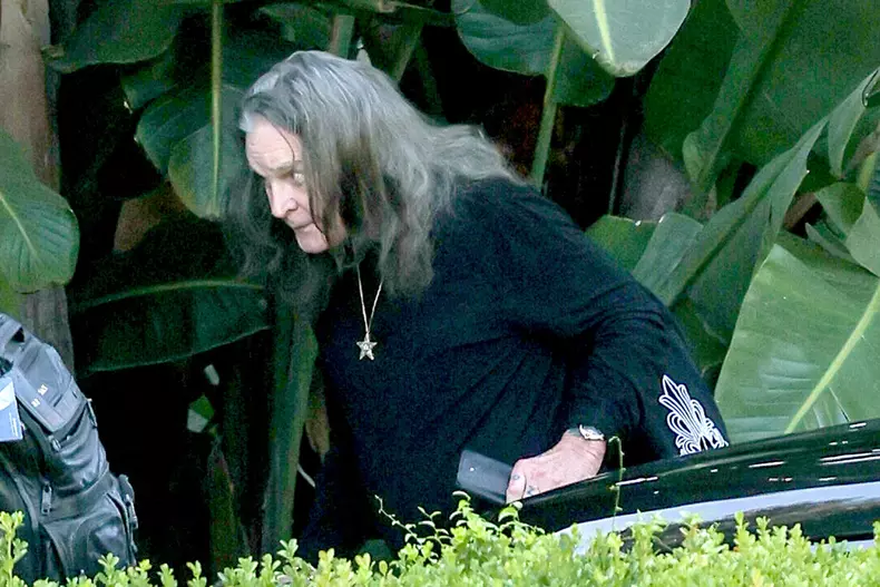 EXCLUSIVE: Ozzy Osbourne Receives A Warm Hug From Red Hot Chilli Peppers Drummer Chad Smith As They Meet Up Before Returning Home To Find Detectives Amid LA Crime Wave.