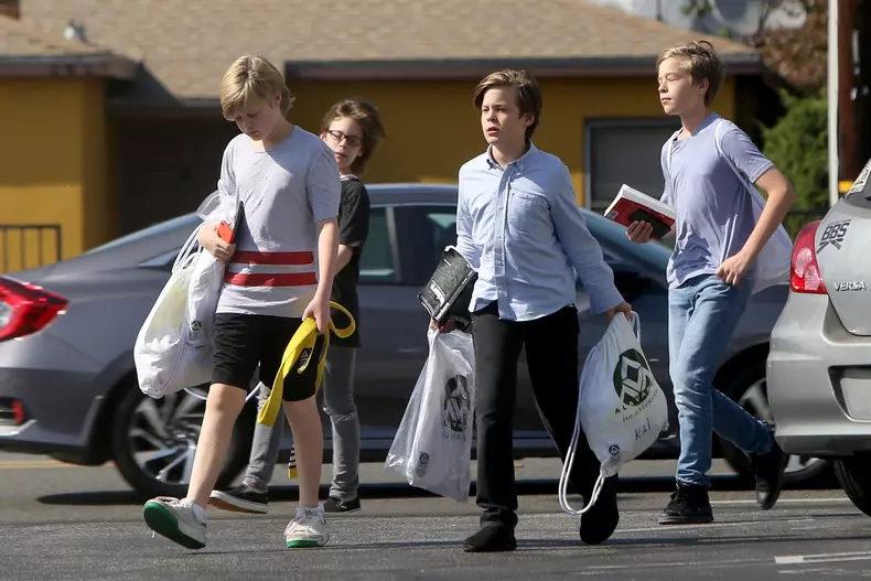 EXCLUSIVE: The apple doesn't fall far from the tree! One of Elon Musk's young sons is seen leaving a Jiu Jitsu class holding a book titled, "Hackers."