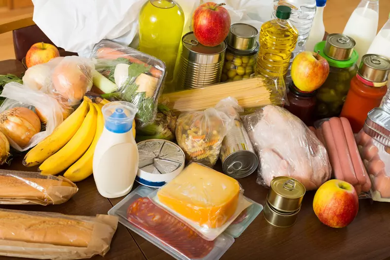 View at table with articles of food for  family
