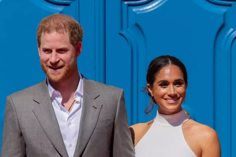 Britain's Prince Harry and his wife Meghan