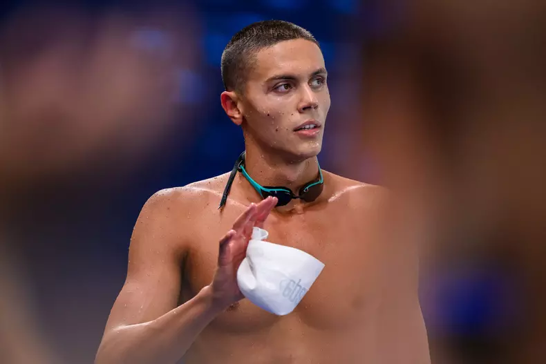 David Popovici of Romania celebrates after winning the gold