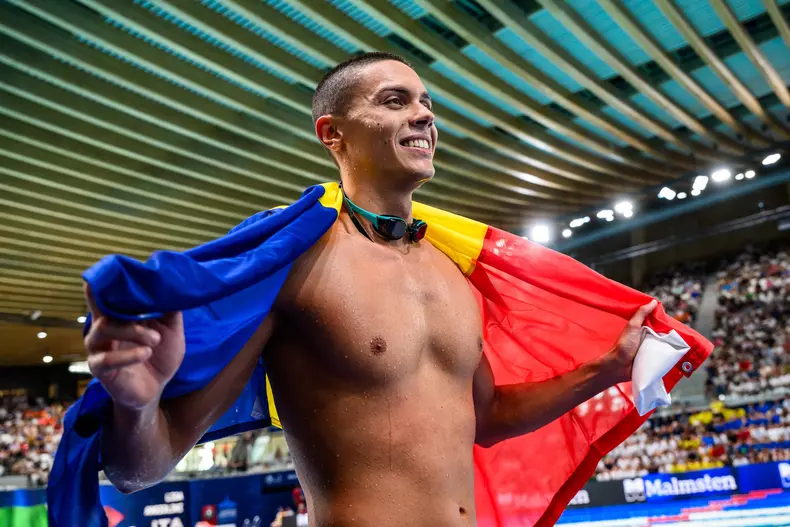 David Popovici of Romania celebrates after winning the gold