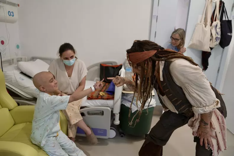 Actor Johnny Depp visits patients at the Nińo Jesús public children's hospital