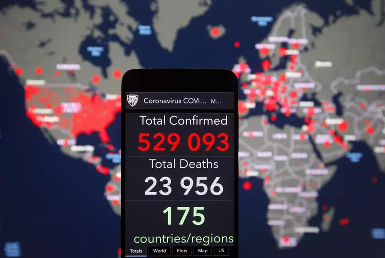 The Coronavirus COVID-19 Global cases map on a screen in Kiev, Ukraine - 27 Mar 2020