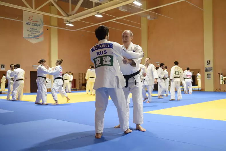 President Vladimir Putin meets with Russian judo national team members