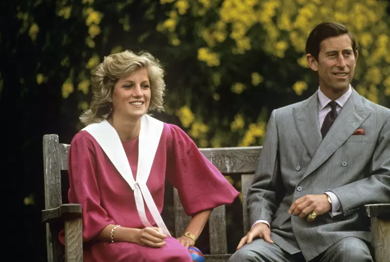Prince Charles and Princess Diana on a bench