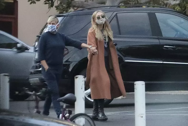 *EXCLUSIVE* Ellen DeGeneres and Portia de Rossi show rare PDA