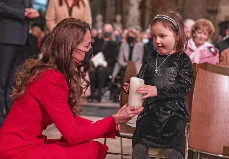 File photo dated 08/12/2021 of The Duchess of Cambridge talks to Mila Sneddon, 6, ahead of the Together At Christmas community carol service at Westminster Abbey in London. As Kate turns 40 this weekend, more than a decade on from marrying into the royal