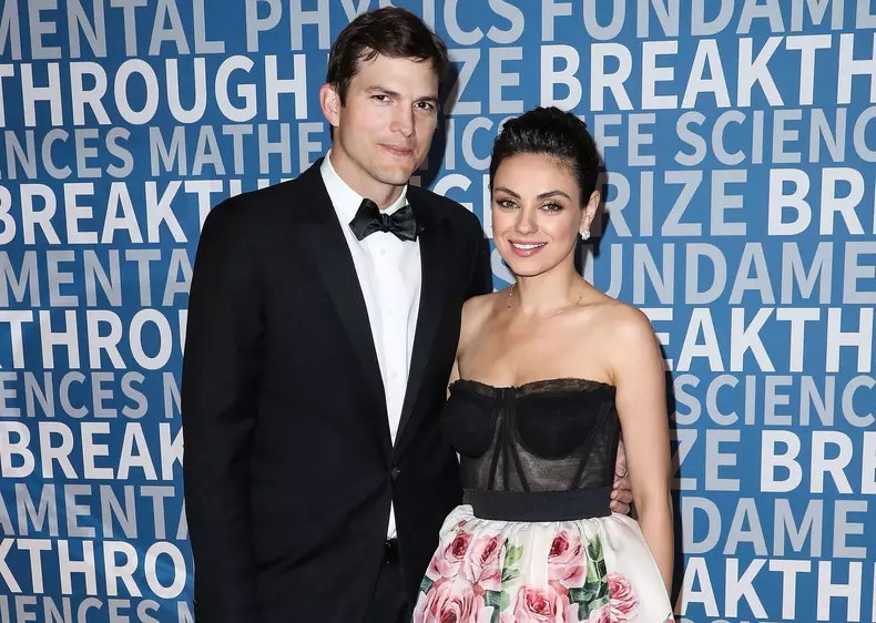 Ashton Kutcher and Mila Kunis pose at the 2018 Breakthrough Prize Ceremony