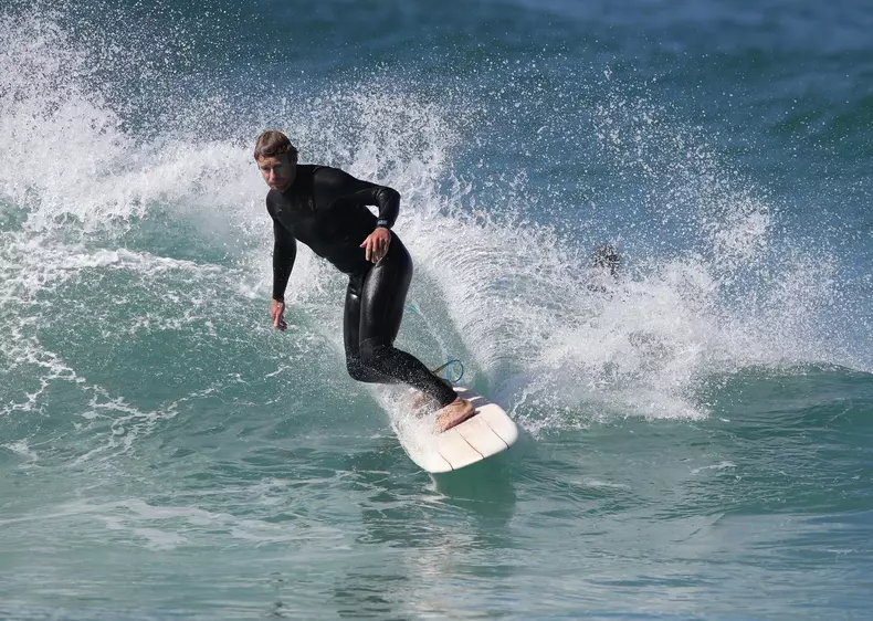 *PREMIUM-EXCLUSIVE* Boys surf club!  Simon Baker and his neighbour Andrew Johns enjoyed an afternoon of surfing in Sydney.
