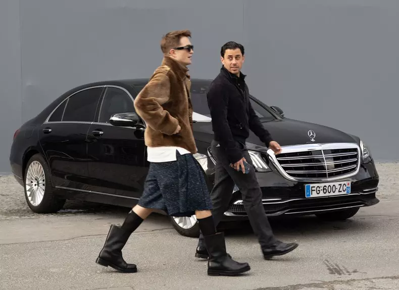 Robert Pattinson wearing a kilt leaves Dior show - Paris