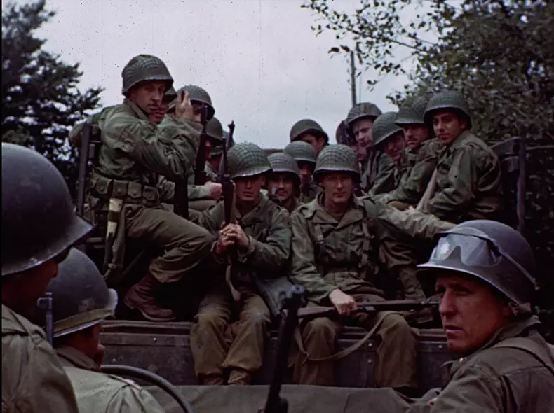 u.s-soldiers-on-back-of-truck
