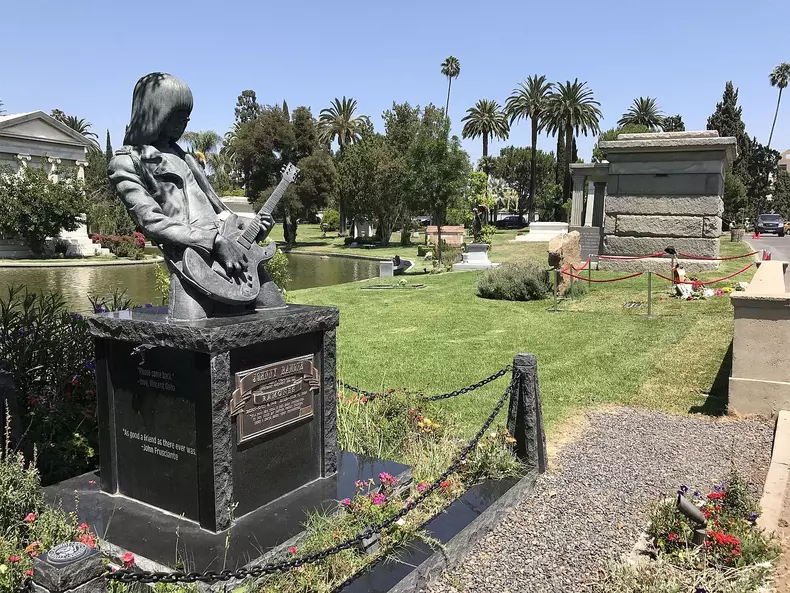 *EXCLUSIVE* Fans pay tribute to Chris Cornell's grave site on the same day his friend Chester Bennington commits suicide