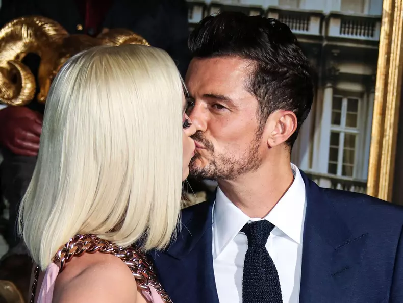 (FILE) Katy Perry Receives Backlash After Blue Origin Space Flight. HOLLYWOOD, LOS ANGELES, CALIFORNIA, USA - AUGUST 21: Singer Katy Perry and fiance/actor Orlando Bloom arrive at the Los Angeles Premiere Of Amazon's 'Carnival Row' held at the TCL Chinese