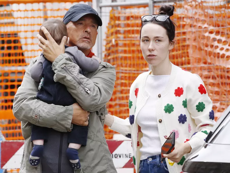 EXCLUSIVE: Eros Ramazzotti is a tender grandpa, out in Milan with grandson Cesare Augusto Cerza, daughters Aurora and Raffaela, and girl-friend Dalila Gelsomino