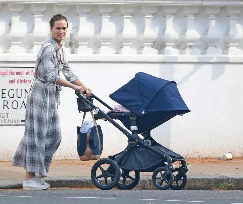 *EXCLUSIVE* *WEB MUST CALL FOR PRICING BEFORE USAGE* The Duchess of Cambridge's sister Pippa Middleton spotted basking in the evening sunshine as pushes a pram along the streets of Chelsea.