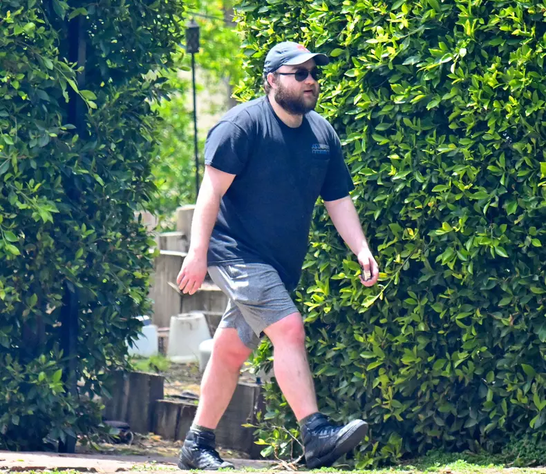 EXCLUSIVE: Two and a half Men star Angus T Jones has two trucks full of 'junk' hauled away from his home in Los Angeles