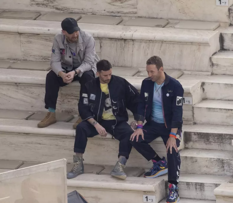 *EXCLUSIVE* Chris Martin and his bandmates pose during a shoot at the Odeon of Herodes Atticus in Athens