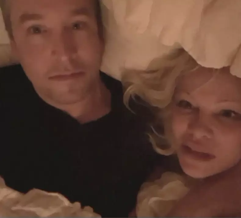 Pamela Anderson and new husband do TV interview from their bed