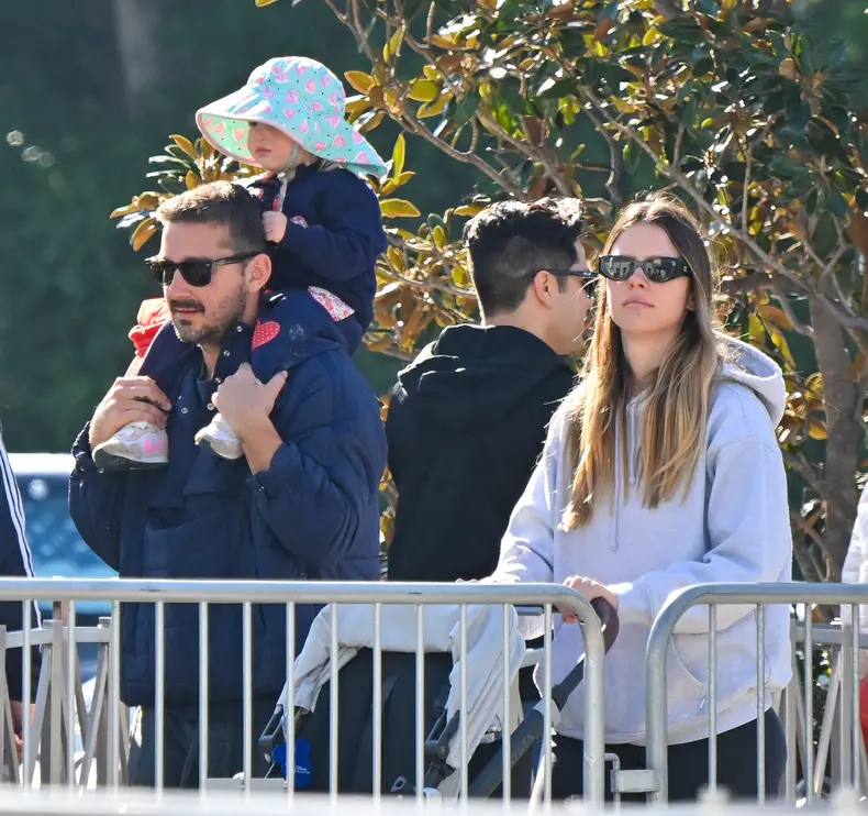 EXCLUSIVE: Shia LaBeouf and Mia Goth leave their legal troubles behind them and spend quality time with their daughter Isabelle at Universal Studios for a fun morning