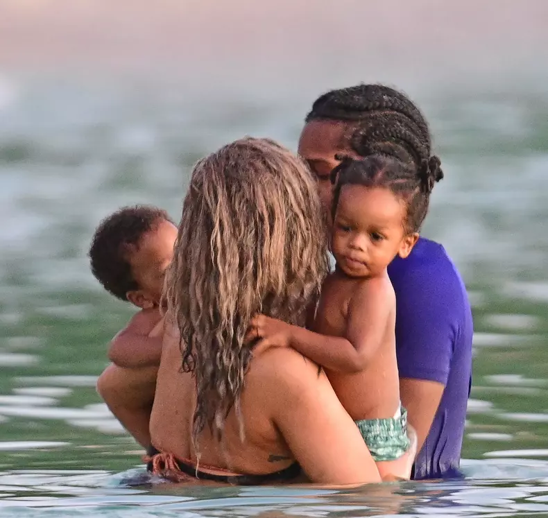 *PREMIUM-EXCLUSIVE* *MUST CALL FOR PRICING* The Grammy-Winning Superstar Rihanna wears her sultry black maxi beach dress watching the sun go down and taking a dip in the sea with her beau Asap Rocky during their family holiday in Barbados.
**PICTURES TAKE