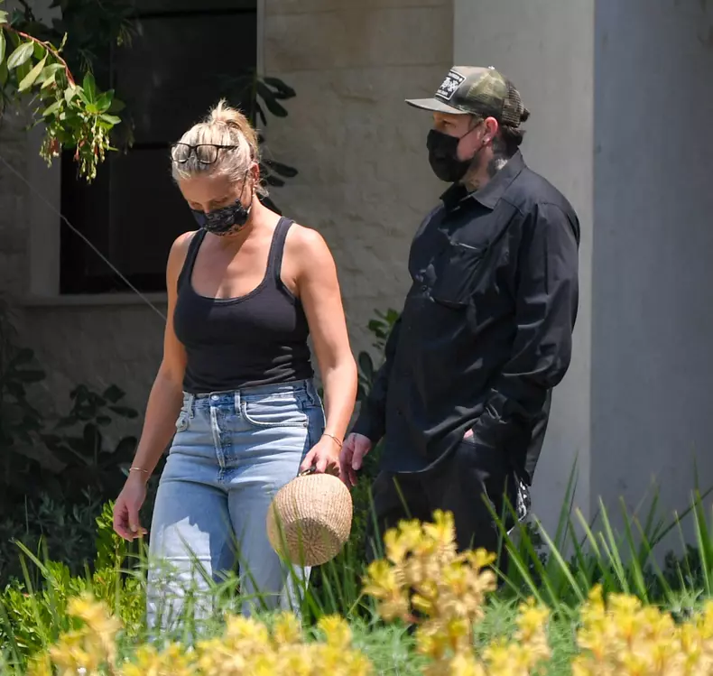 EXCLUSIVE: Cameron Diaz and Benji Madden leave a showing of a home worth $13,980,000