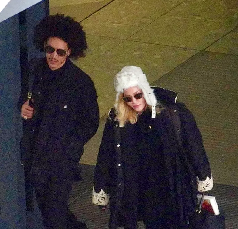 Singer Madonna and rumoured new boyfriend Ahlamalik Williams pictured arriving in London after spending Christmas in New York.