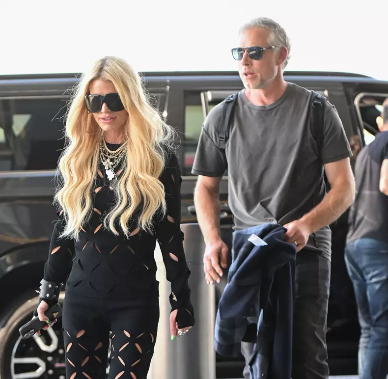 Jessica Simpson with Eric Johnson Spotted at JFK Airport in New York City.