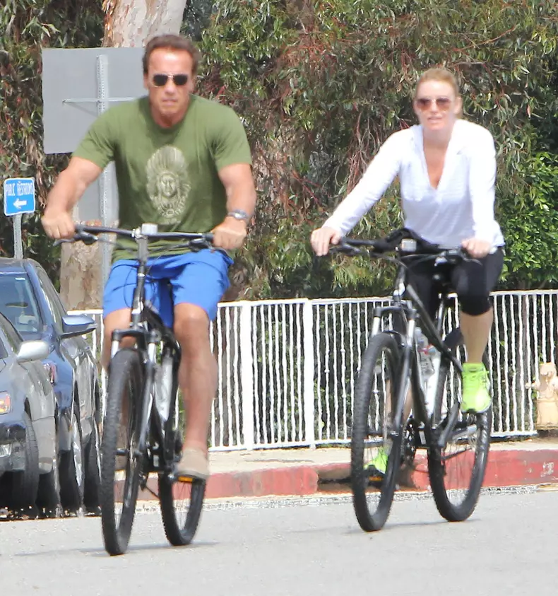 Arnold Schwarzenegger & Heather Milligan Out For A Bike Ride