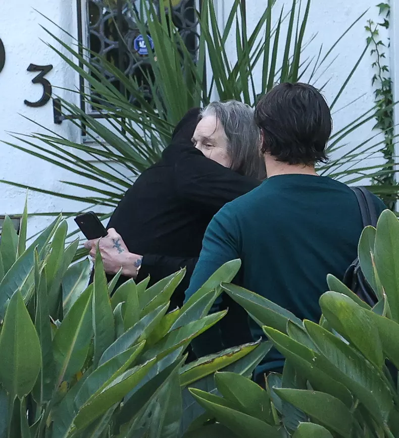 EXCLUSIVE: Ozzy Osbourne Receives A Warm Hug From Red Hot Chilli Peppers Drummer Chad Smith As They Meet Up Before Returning Home To Find Detectives Amid LA Crime Wave.