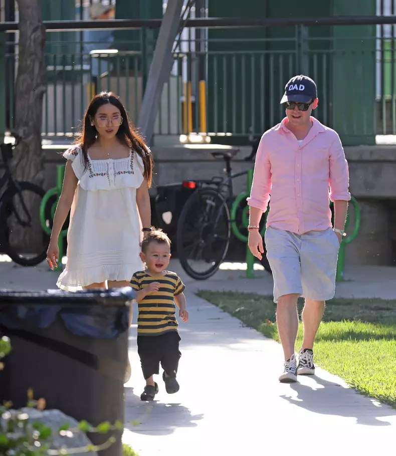 Former child superstar Macaulay Culkin is one proud papa as he enjoys a family day out with fiancŽe Brenda Song and their young son Dakota, 16 months, on a sunny afternoon in the LA suburbs.