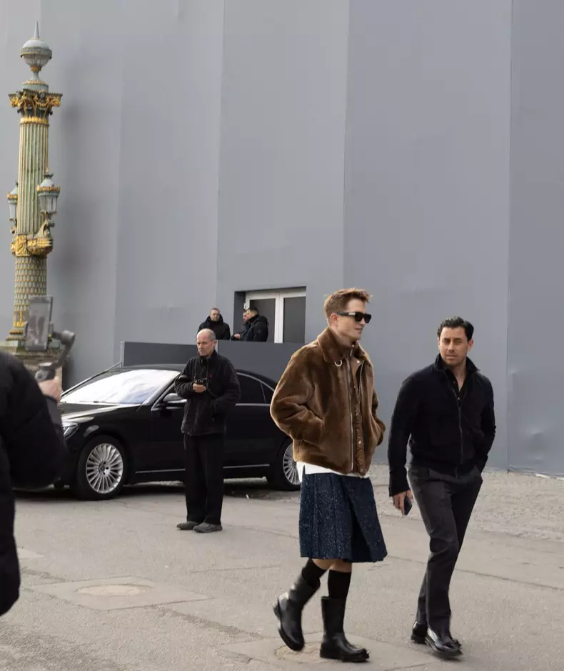 Robert Pattinson wearing a kilt leaves Dior show - Paris