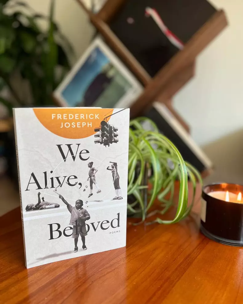 Cartea de poezii „We Alive, Love”, scrisă de autorul Frederick Joseph