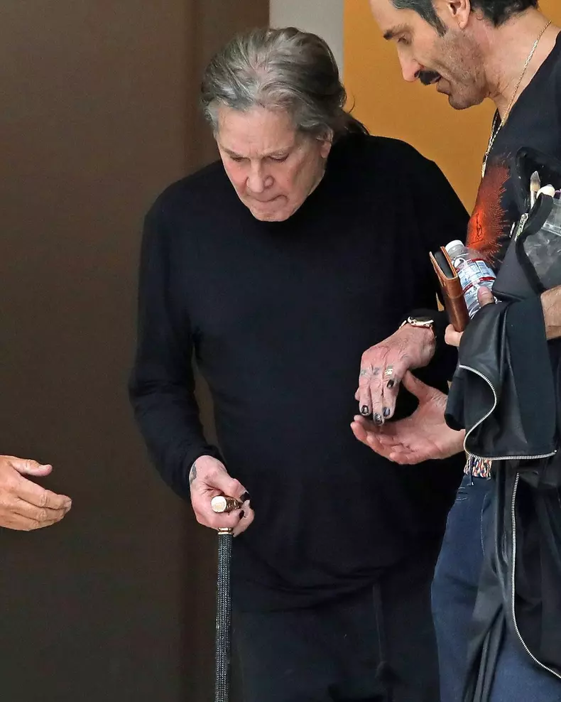 *EXCLUSIVE* Ozzy Osbourne gets some help down the stairs as he exits Milk Studios in LA