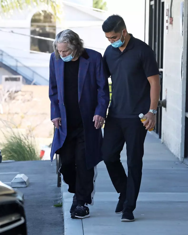 *EXCLUSIVE* Ozzy Osbourne appears very frail and tired as he is seen leaving LA fitness center after shooting mega-bucks Super Bowl commercial