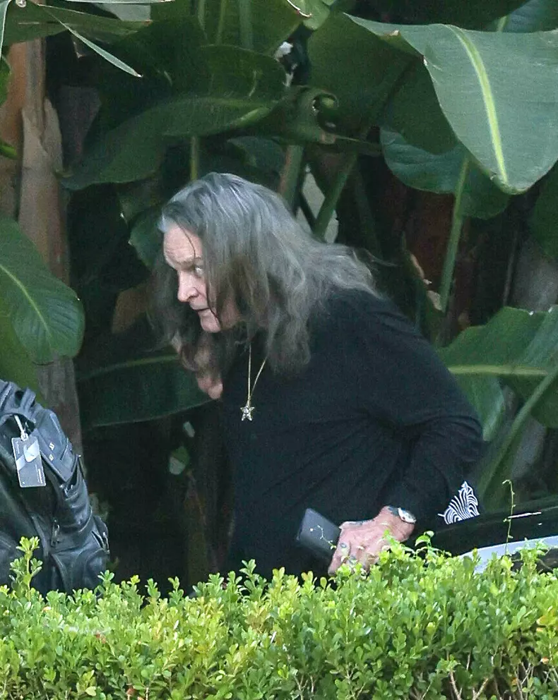 EXCLUSIVE: Ozzy Osbourne Receives A Warm Hug From Red Hot Chilli Peppers Drummer Chad Smith As They Meet Up Before Returning Home To Find Detectives Amid LA Crime Wave.