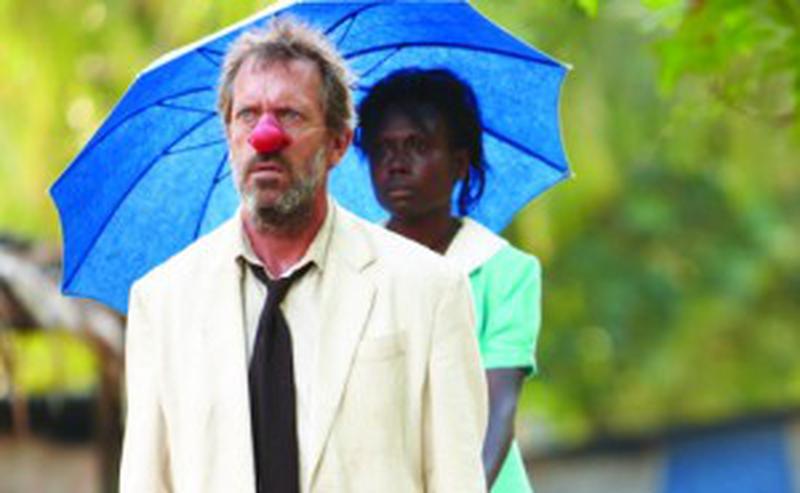 Hugh Laurie as Mr. Watts and Florence Korokoro as Grace Watts in MR. PIP