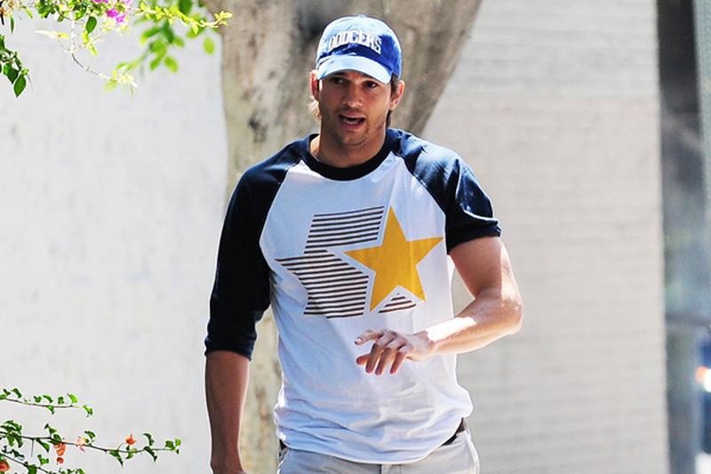 Mila Kunis and Ashton Kutcher take Mila's Baby Bump dressed in Dodgers blue to L.A. Dodgers Baseball Game