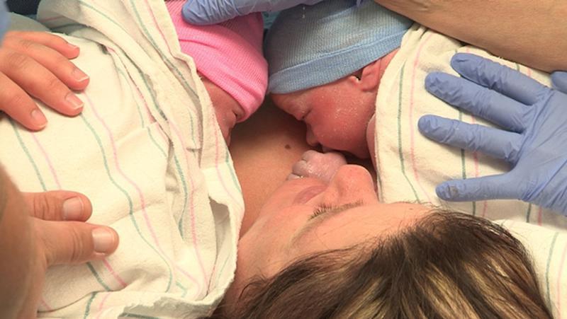 Newborn twins with their mother.??(photo credit: PERNEL)