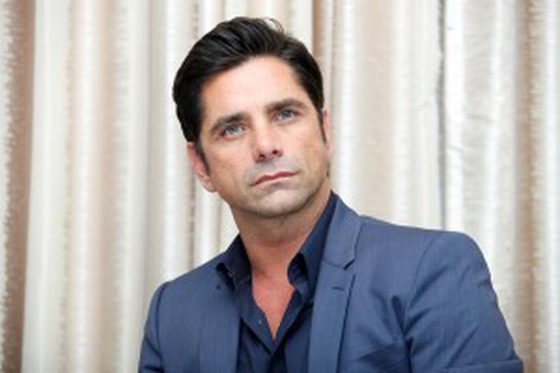 John Stamos en conférence de presse pour le film TV 