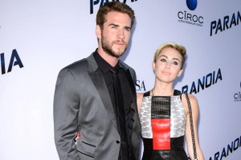 Liam Hemsworth and Miley Cyrus attend the premiere of 'Paranoia' at DGA Theater in Los Angeles, California, 08.08.2013. Credit: Lionel Hahn/Abaca/face to face - Germany, Luxemburg, Eastern Europe and Russia rights only -