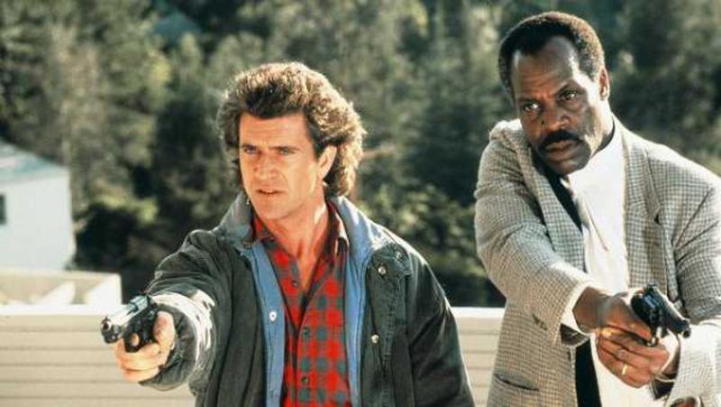  Mel Gibson și Danny Glover (Lethal Weapon, 1987)