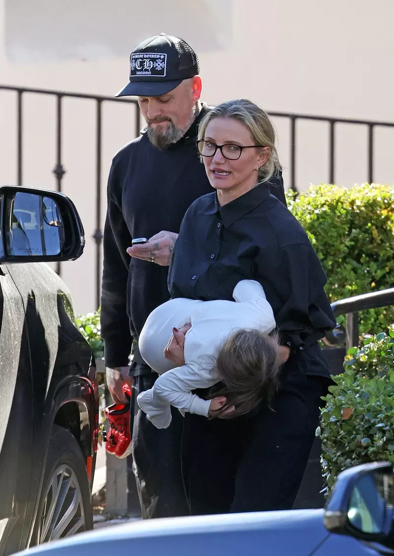 *EXCLUSIVE* Cameron Diaz and rocker husband Benji Madden coordinate styles as they enjoy a family breakfast on Sunday in Montecito