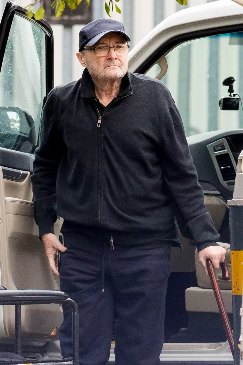 *PREMIUM EXCLUSIVE – NO WEB UNTIL 09.00 AM EST 29TH OCTOBER** A frail looking Phil Collins is helped into a wheelchair amid his ongoing battle to evict ex-wife Orianne Cevey from his $32 million Miami mansion.