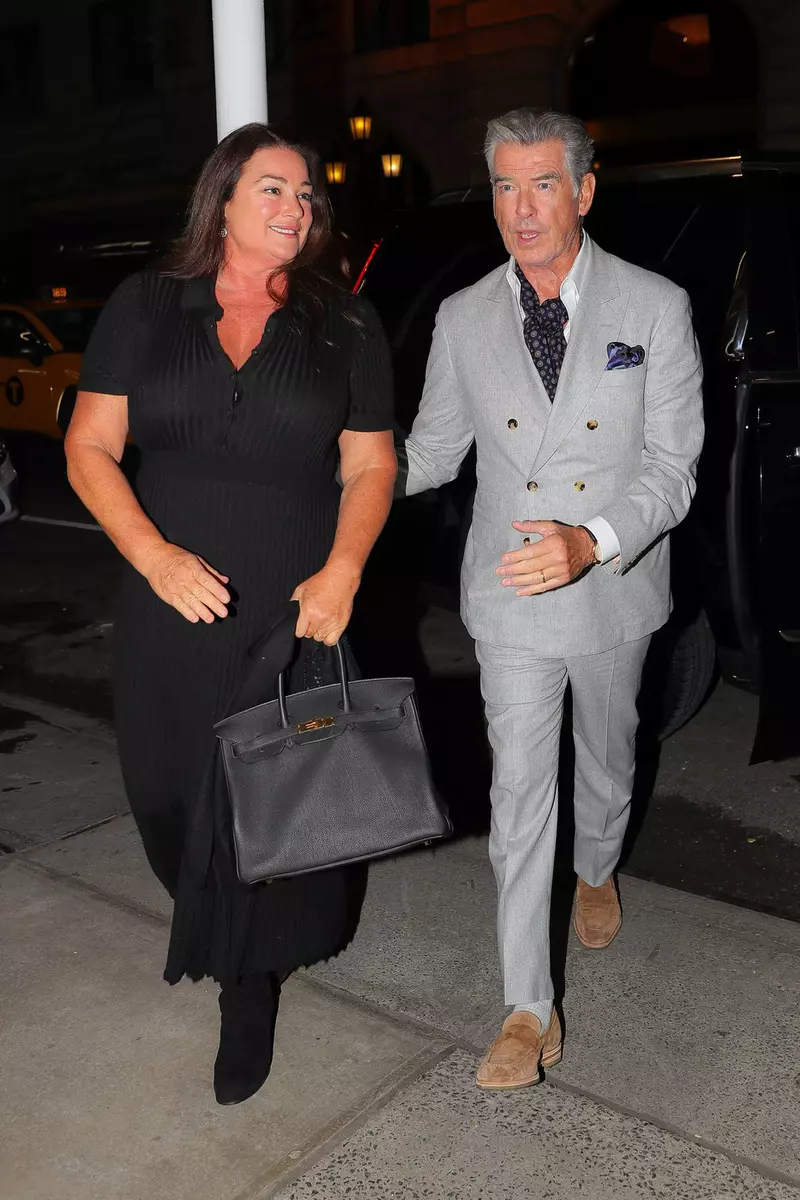 EXCLUSIVE: Pierce Brosnan and wife Keely Shaye Smith were spotted arriving at Polo Bar for dinner in New York City