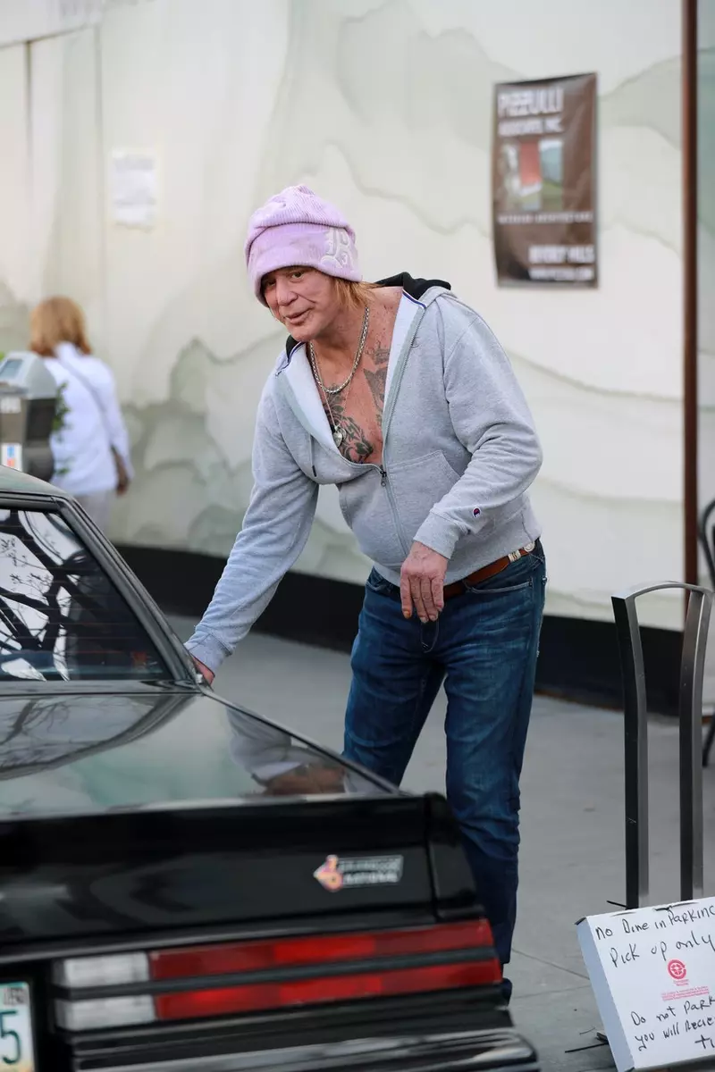 *EXCLUSIVE* Mickey Rourke spending time with pals in BH